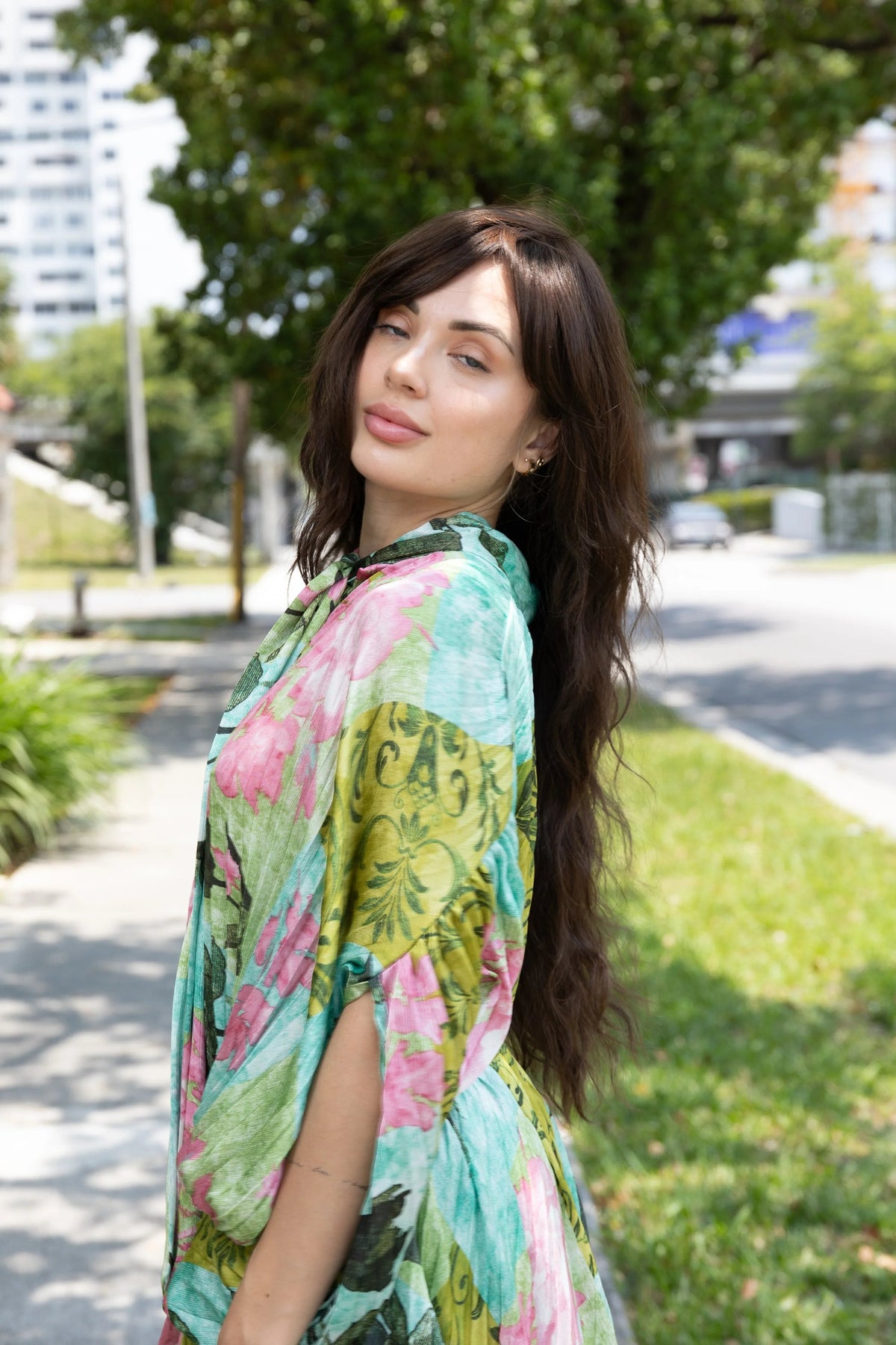 Client with long human hair weft extensions fitted at Dorin Wigs in Fort Lauderdale