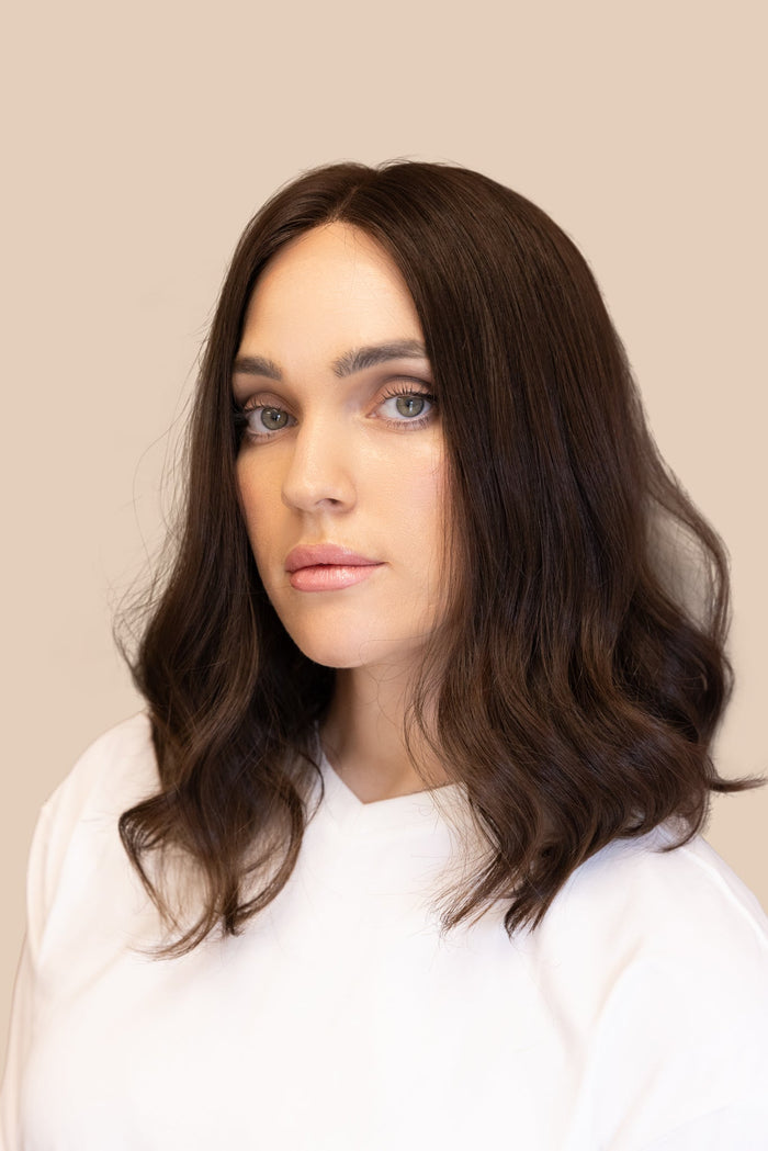 Human hair wig restoring a natural look for a client with medical hair loss, at Dorin Wigs in Fort Lauderdale
